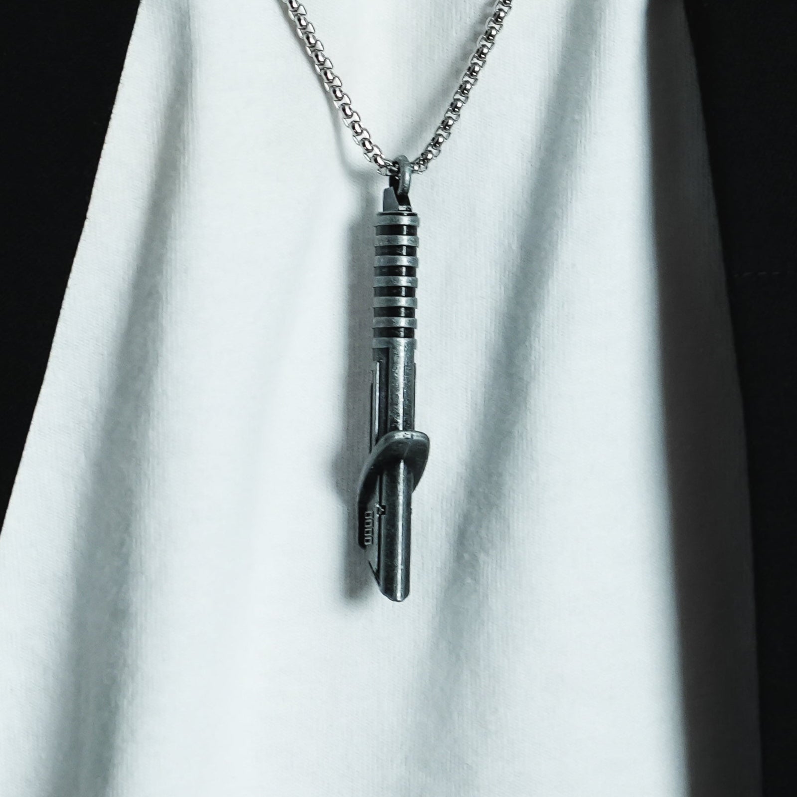 Saber Hilt Necklace